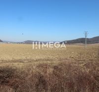 Agricultural and forest land in Lackovce, Lackovce with a view of the surrounding nature and hills.
