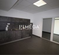 Offices with a kitchenette, ceramic tiles, and glass doors.