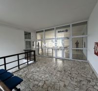 Offices with stone flooring and glass doors, equipped and feeling spacious.