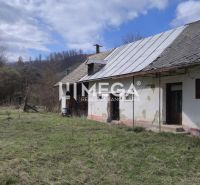 A family house in Čabiny on Čabiny Street, surrounded by nature with a spring atmosphere.
