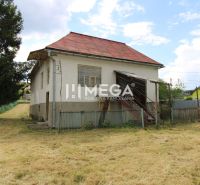A family house in the village of Zbudská Belá on Zbudská Belá street with a large yard.