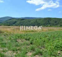 The landscape in Zemplínske Hámre suitable for residential plots, surrounded by green forests and meadows.