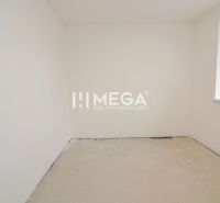 A room with white walls, a window, and an uneven floor in a 3-room apartment.