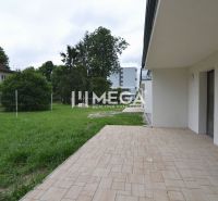 A terrace next to a 3-room apartment on Pod Hradom Street in Strážske, surrounded by greenery.