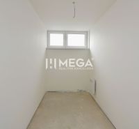 A narrow room with a window in a three-room apartment.