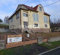 Family house for sale in Humenné on Janka Kráľa Street with a garden and a fence.