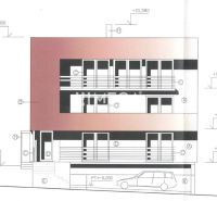 Design of the facade of a family house on Janka Kráľa Street, Humenné with three floors and cars.