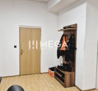 Offices with a shelf, a hanger, and a floor with a wooden decor.
