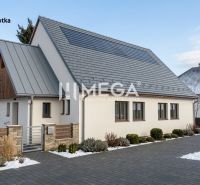 A house with a modern roof and garden in snowy Zboj, suitable for commercial spaces.