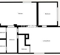 The floor plan of the family house includes a kitchen, a living room, a bedroom, and two bathrooms.