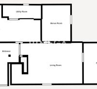 The floor plan of the family house includes a kitchen, living room, utility room, and bonus room.