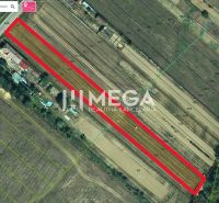 Aerial view of residential plots in Zubné, bordered by a red line.