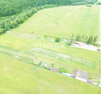 Meadow plots for housing in Zubné, surrounded by greenery and natural environment.