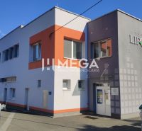 Office building on Lipová Street in Humenné with a clean facade and parking.