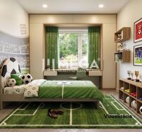 Children's room in a family house with a football theme; green decorations and football motifs.