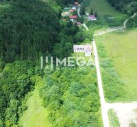 Aerial view of properties - housing surrounded by greenery in Medzilaborce on Danova Street.