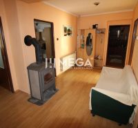 Interior of a family house with tiles and wooden decor flooring.
