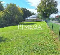 Garden on plots - living in the city of Staré, near Staré Street, fenced with a mesh.