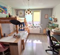 Children's room with a bunk bed, a work desk, and a floor with a wooden decor in a 3-room apartment.