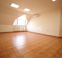Commercial premises with ceramic flooring, air conditioning, and a large window.