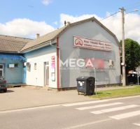 Commercial premises on Duklianskych hrdinov Street, Vranov nad Topľou, near a busy road.