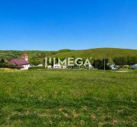 Hills with a church in the background, Land - residential in Víťazovce, ideal for construction.