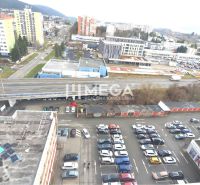 A view of the commercial premises on Štefánikova Street in Humenné with a parking lot.