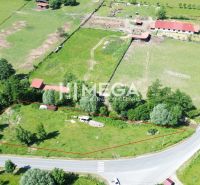 Plots - housing in Ptičie, surrounded by greenery near the main road.