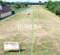 Plots - housing in Jasenov with land divided by colored lines and bales of straw.