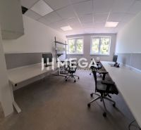 Offices with computers and chairs, floor with wood decor.
