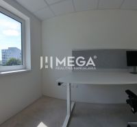 Office space with a desk, chair, and computer, view of Laborecká Street.