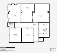 Floor plan of offices with multiple rooms, including bathrooms and a hallway.