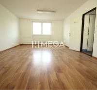 Offices with white walls and a floor with a wooden decor, an empty space without furniture.
