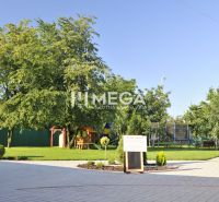 Garden with a children's playground and a fountain on Budovateľská Street in Vranov nad Topľou.