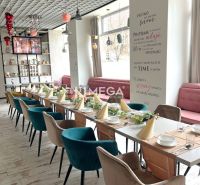 A restaurant with creative decorations, a surface with wooden decor, and arranged table settings.