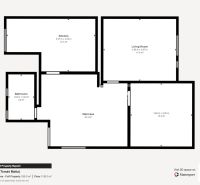 Ground floor plan of a family house with a kitchen, living room, and bathroom.