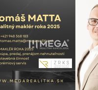 Real estate agent's business card with contact for MEGA real estate agency.