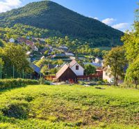 In Košecké Podhradie on Košecké Podhradie Street, there are green plots - living with a view of the hills.