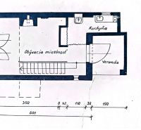 Floor plan of a cottage with an entrance veranda, living room, and kitchen. Gardens.