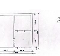Basement floor plan with a layout of three rooms, showing wall and door dimensions.