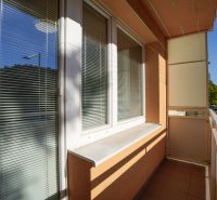 A balcony with a view of Trenčianska Street in Nová Dubnica, near a 1-bedroom apartment.
