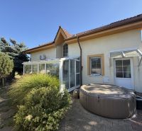 A family house in Zlaté Moravce with a terrace, hot tub, and well-maintained garden.