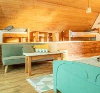 Interior in hotels and guesthouses with wood decor flooring and wood paneling.