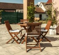 Terrace with wooden furniture in Hotels and Guesthouses in Liptovský Michal.