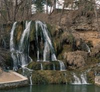 A waterfall surrounded by a forest near Liptovský Michal, an ideal place for relaxation.