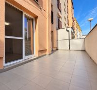 Terrace at a 3-room apartment on Vajanského Street in Trnava with tiling.