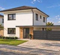 A family house on Vinohrady Street in Senica with a landscaped garden and access road.