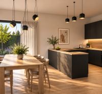 A kitchen in a family house with a wooden decor floor and large windows.