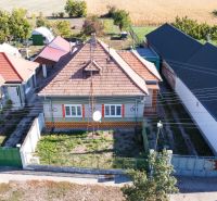 A family house in Kráľov Brod with a spacious yard and access road.