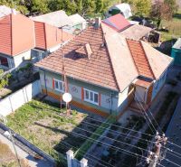 A family house in Kráľov Brod with a terracotta roof and landscaped grounds.